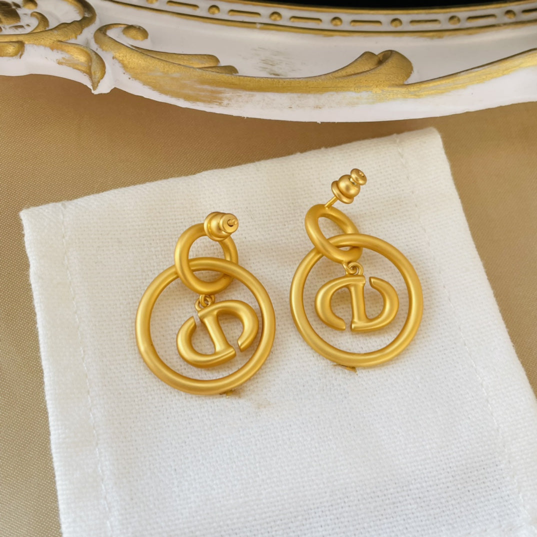 CD NAVY EARRINGS GOLD