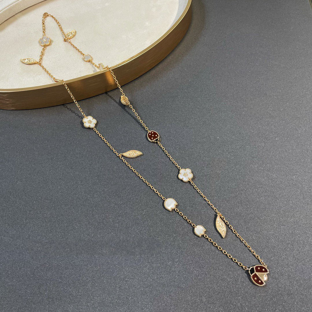 LUCKY SPRING 15 MOTIFS GOLD NECKLACE