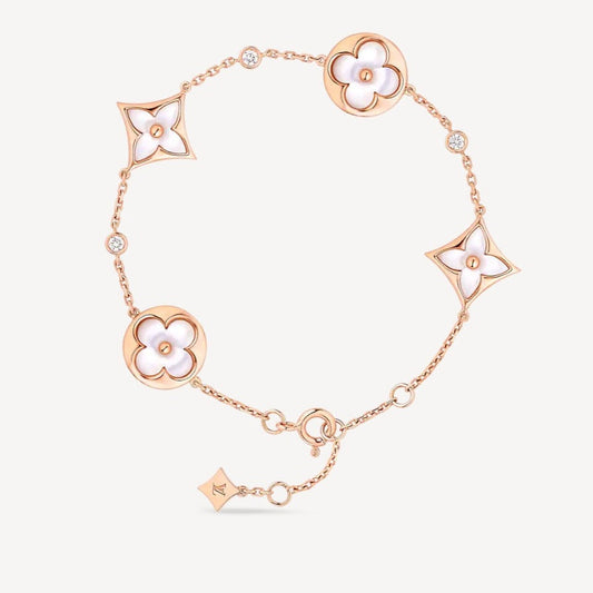 STAR AND SUN 4 MOTIF WHITE MOP PINK GOLD BRACELET