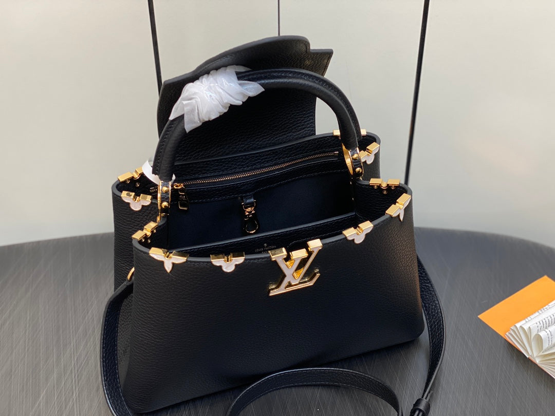 CAPUCINES MM 31 BLACK TAURILLON GOLD HARDWARE