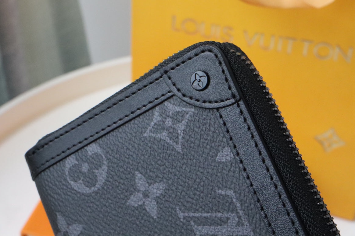 TRUNK ZIPPY WALLET 19.5 BLACK MONOGRAM CANVAS