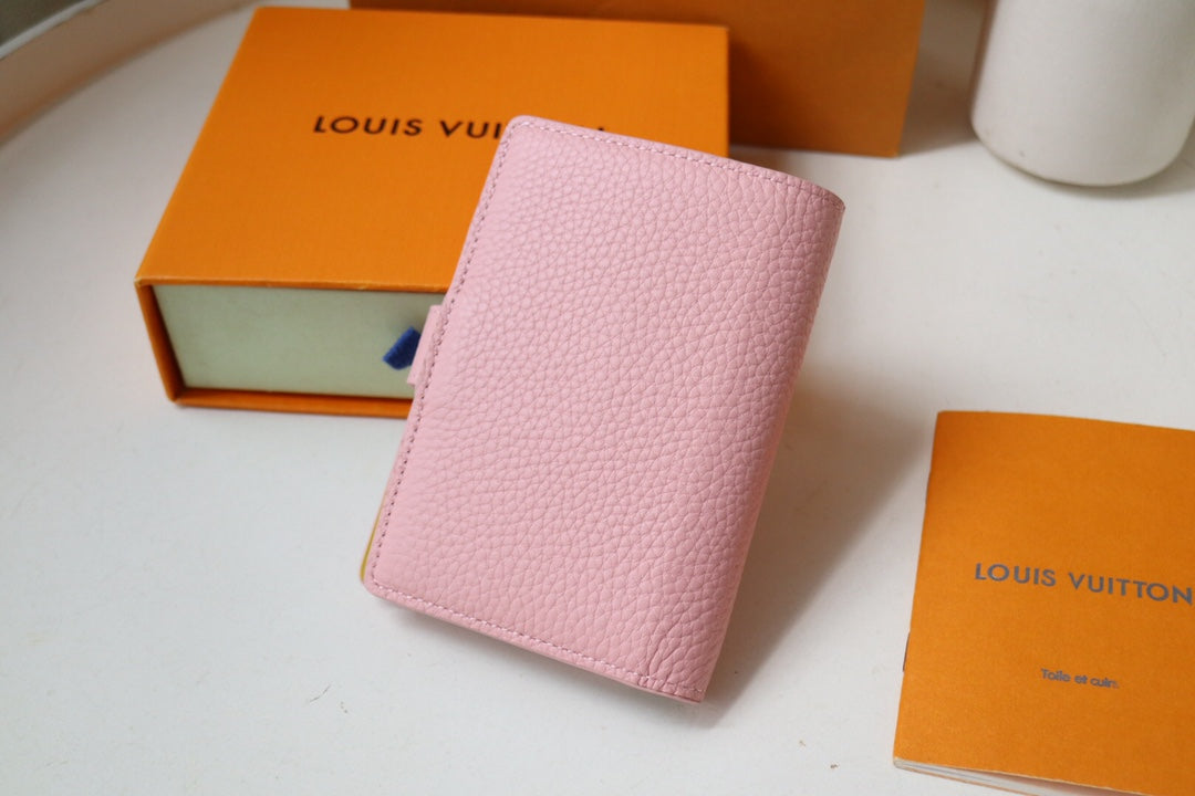 VERTICAL COMPACT WALLET PINK CAPUCINES