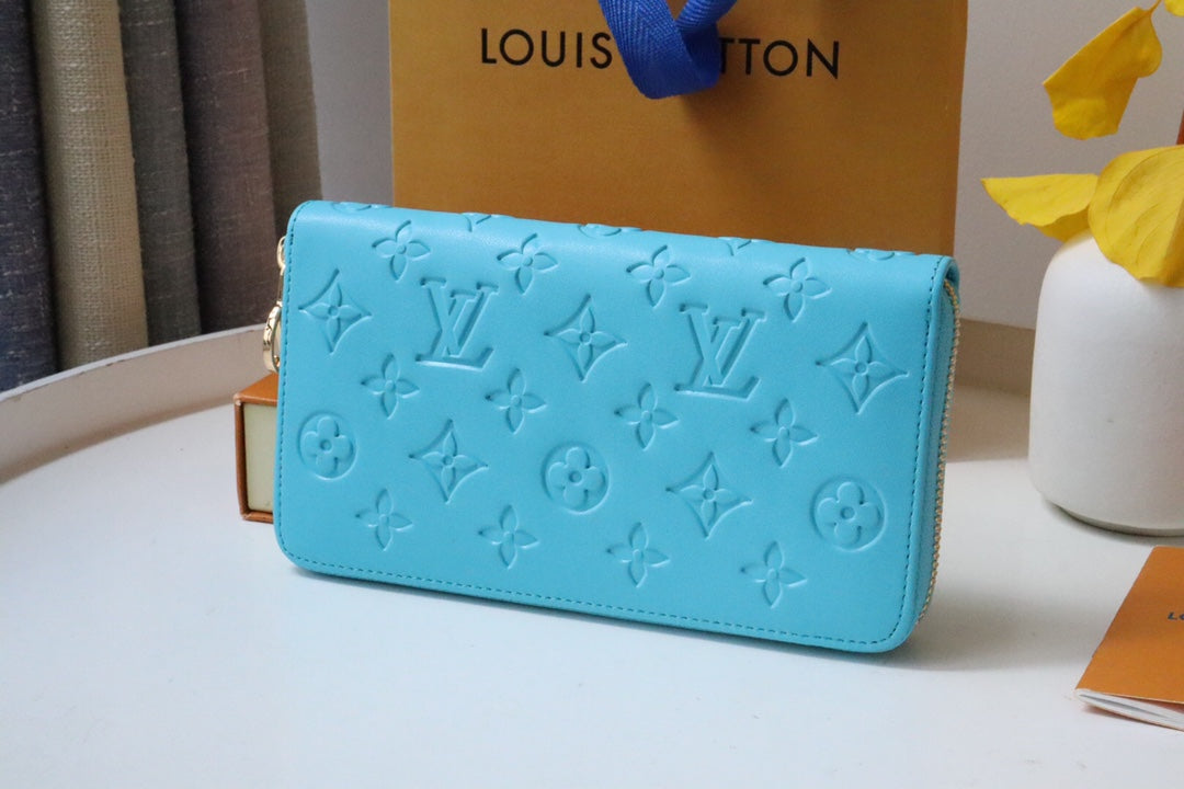 ZIPPY WALLET 19 CLOUD BLUE EMBOSSED LAMBSKIN