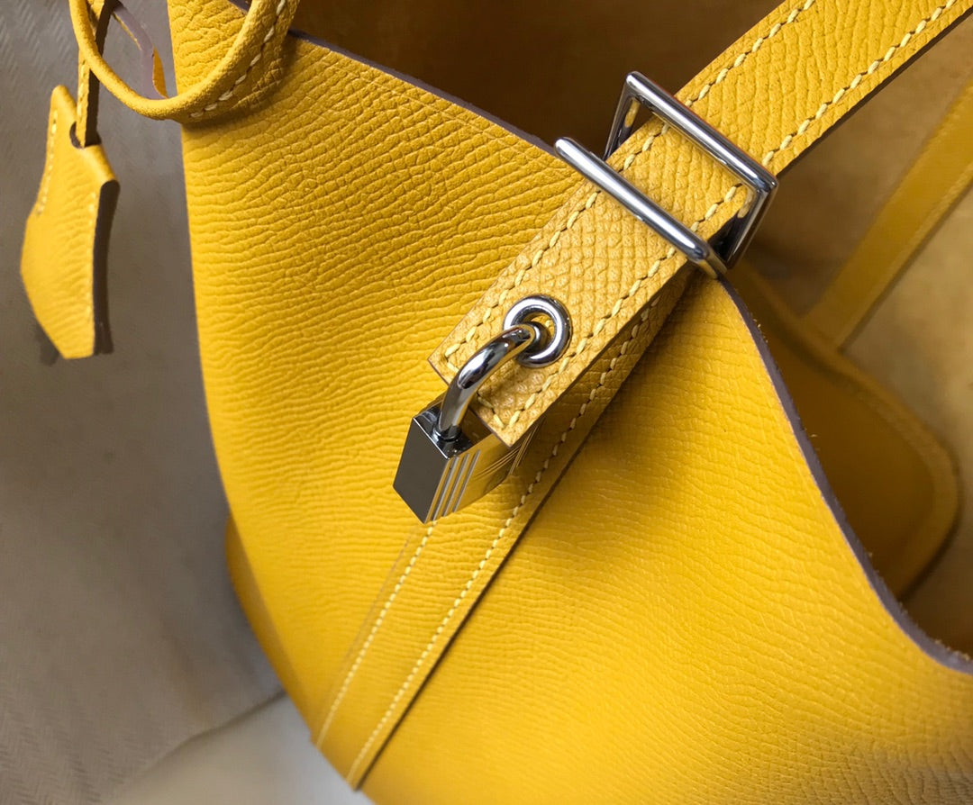 HM PICOTIN LOCK 22 YELLOW EPSOM WITH BRAID STRAP