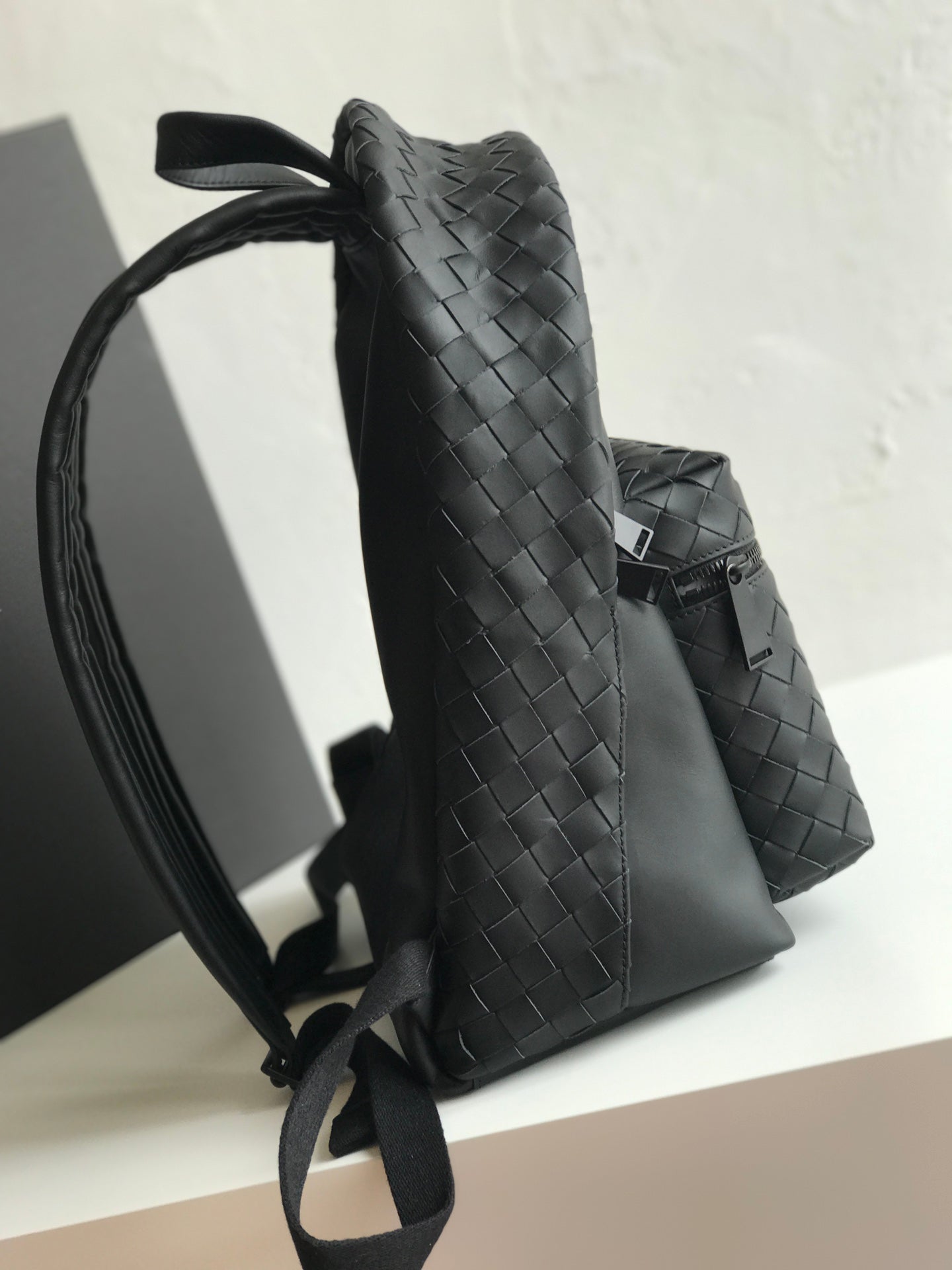 SMALL INTRECCIATO 41 BACKPACK IN BLACK CALFSKIN