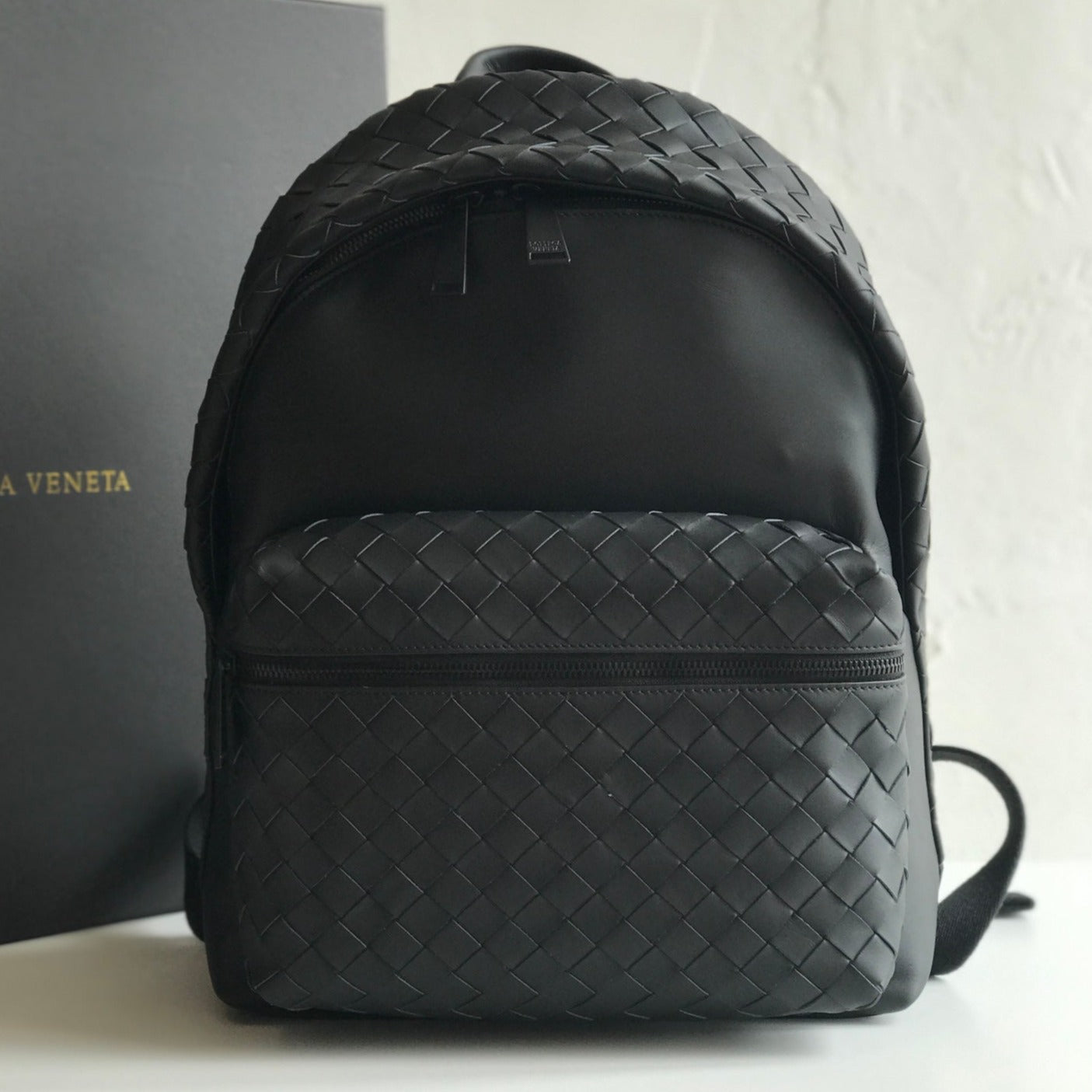 SMALL INTRECCIATO 41 BACKPACK IN BLACK CALFSKIN