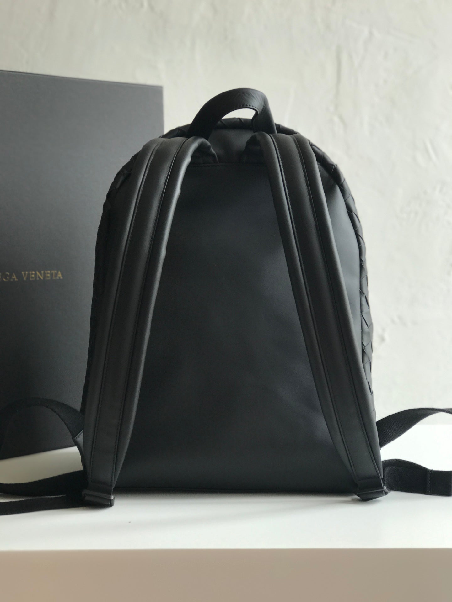 SMALL INTRECCIATO 41 BACKPACK IN BLACK CALFSKIN