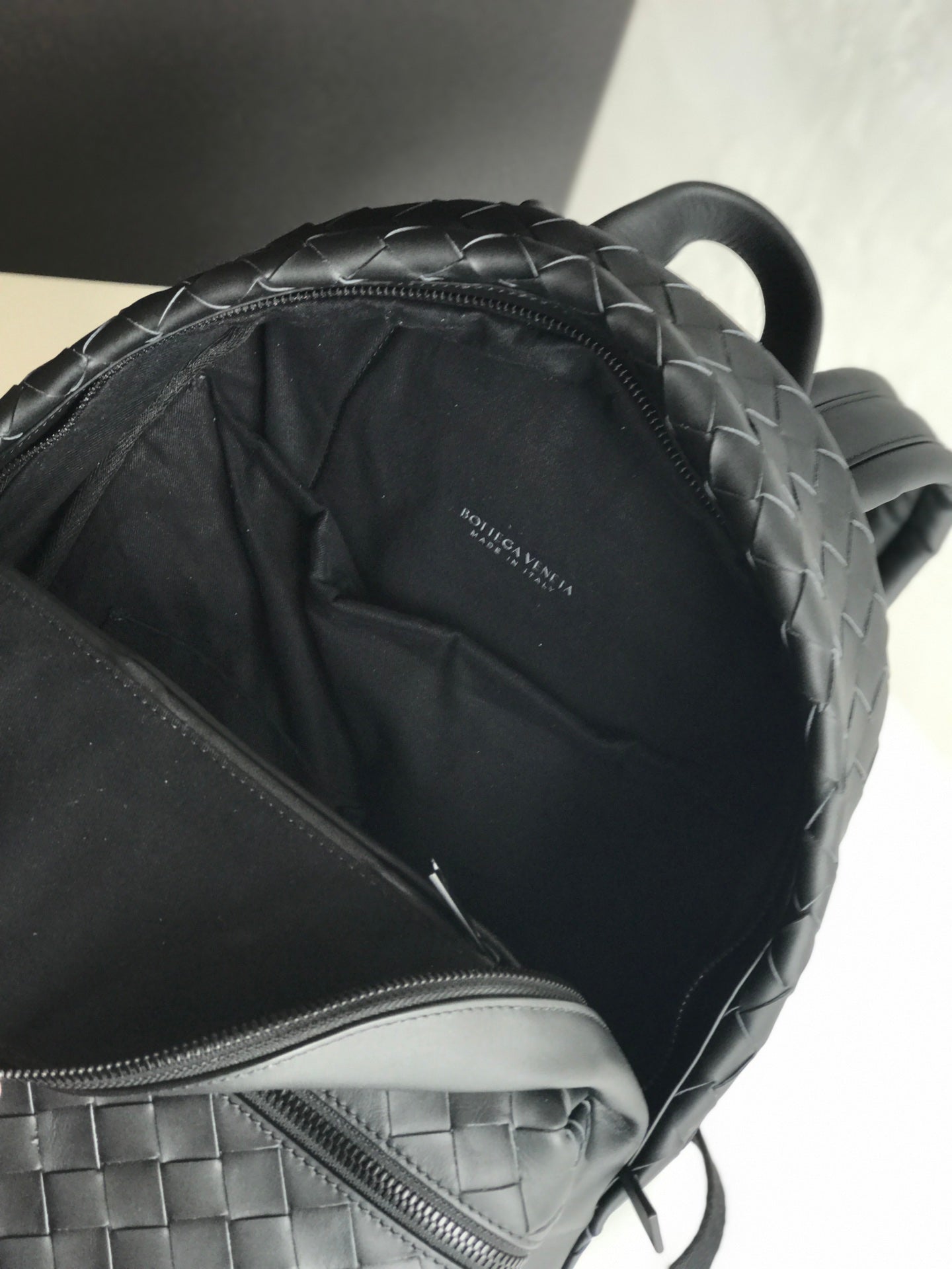 SMALL INTRECCIATO 41 BACKPACK IN BLACK CALFSKIN