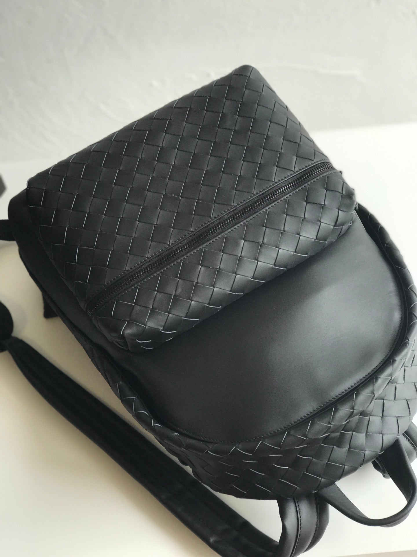 SMALL INTRECCIATO 41 BACKPACK IN BLACK CALFSKIN