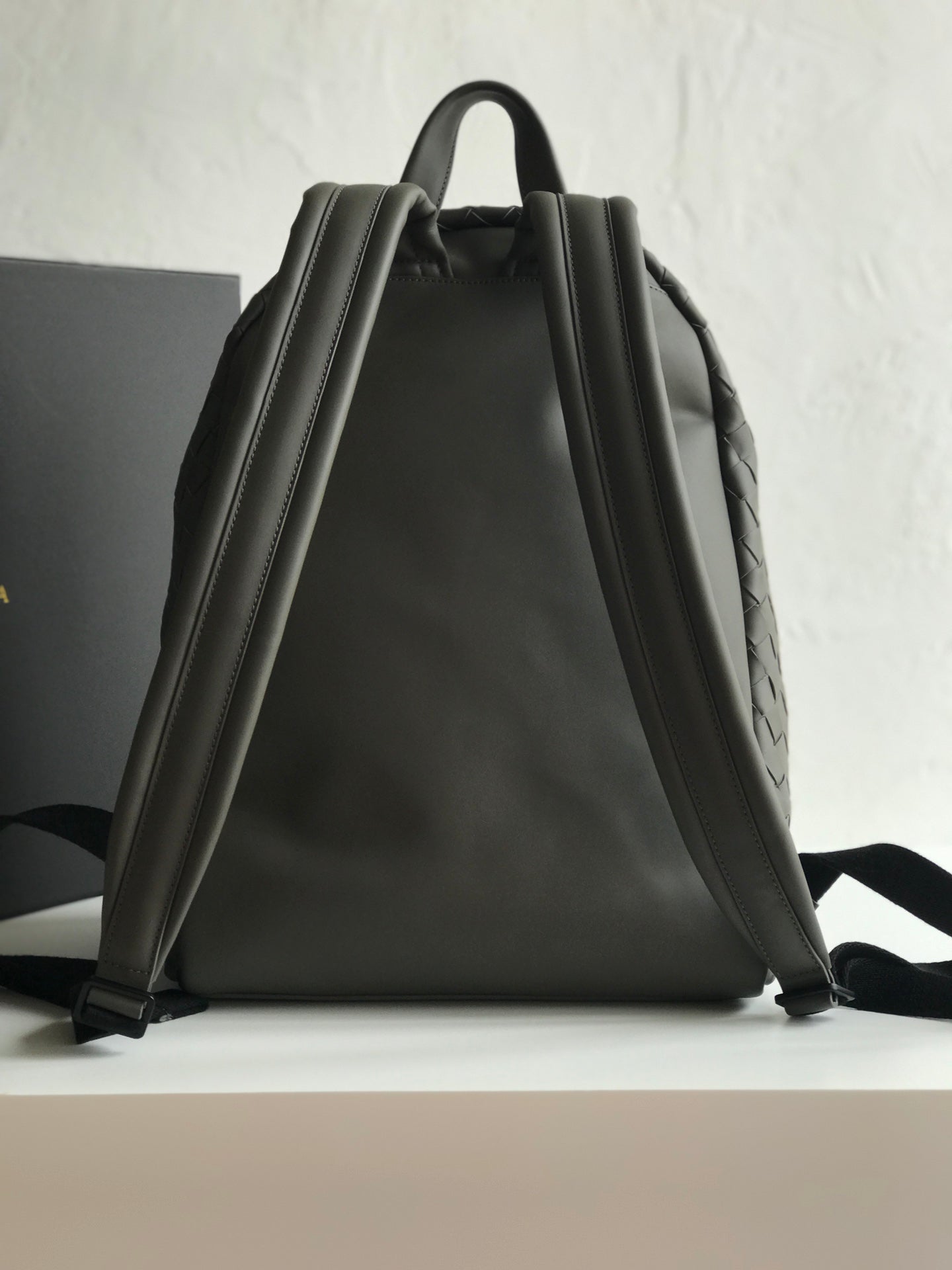 SMALL INTRECCIATO 41 BACKPACK IN CHARCOAL BLACK CALFSKIN