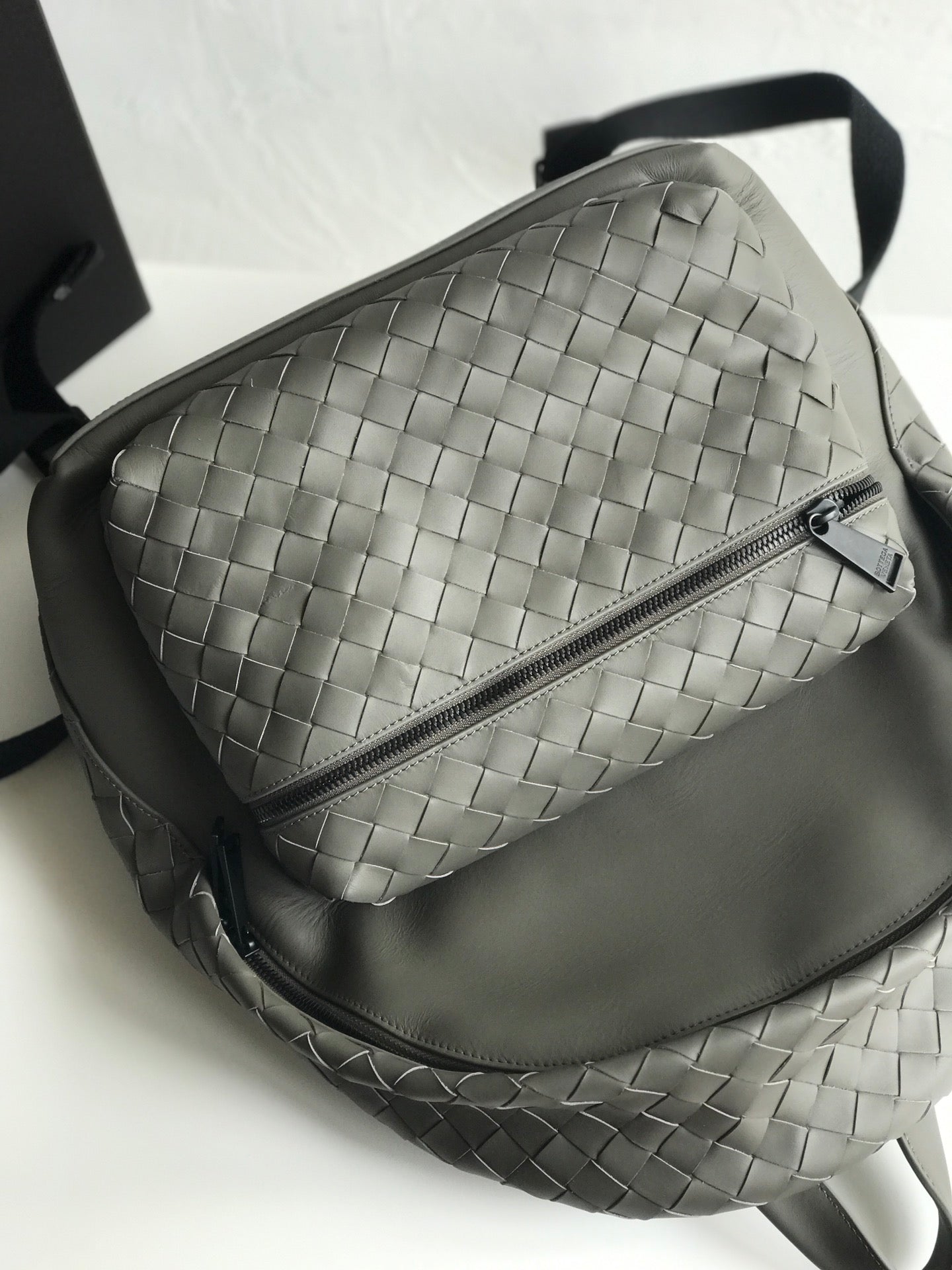 SMALL INTRECCIATO 41 BACKPACK IN CHARCOAL BLACK CALFSKIN