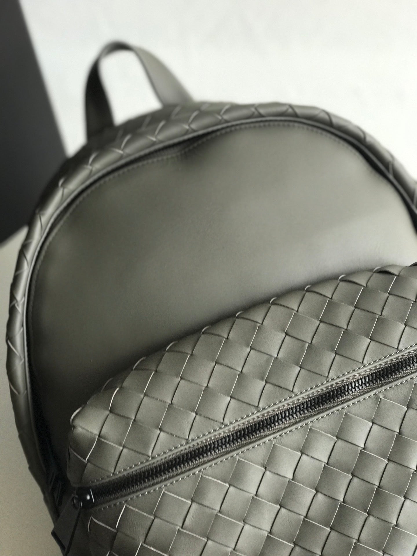 SMALL INTRECCIATO 41 BACKPACK IN CHARCOAL BLACK CALFSKIN