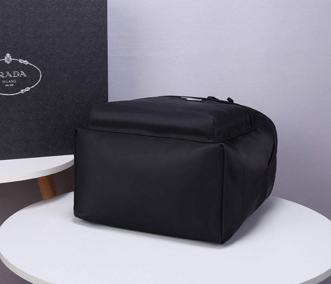 PRA BACKPACK 39 IN BLACK RE-NYLON AND SAFFIANO LEATHER