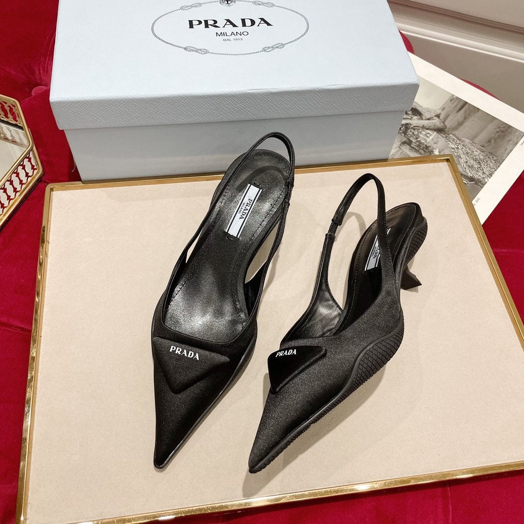 SLINGBACK PUMPS IN BLACK SILK AND SHEEPSKIN LINING WITH TRIANGLE LOGO