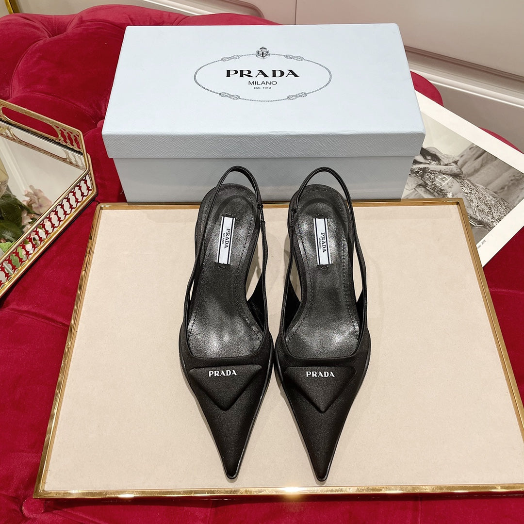 SLINGBACK PUMPS IN BLACK SILK AND SHEEPSKIN LINING WITH TRIANGLE LOGO