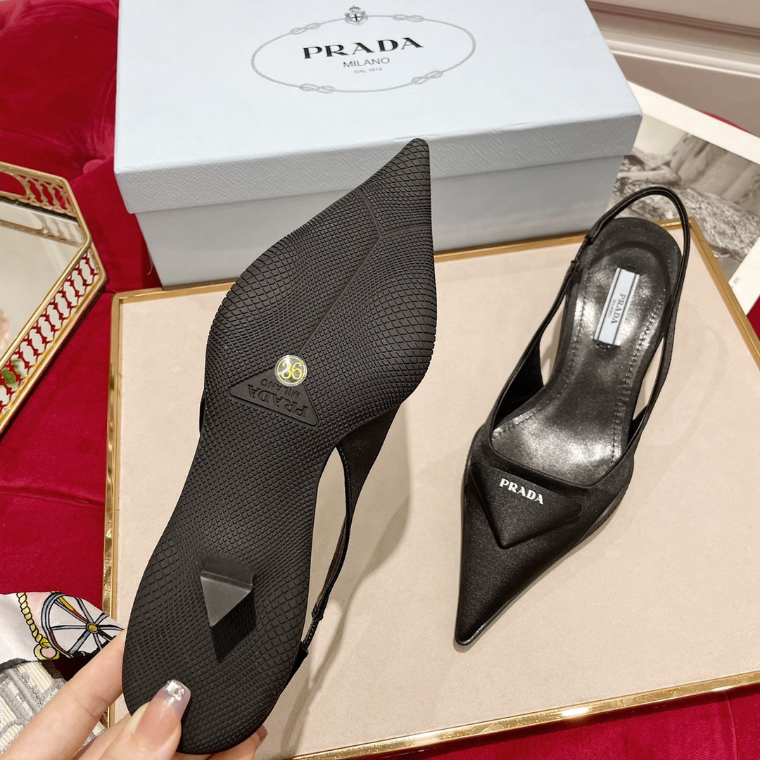 SLINGBACK PUMPS IN BLACK SILK AND SHEEPSKIN LINING WITH TRIANGLE LOGO