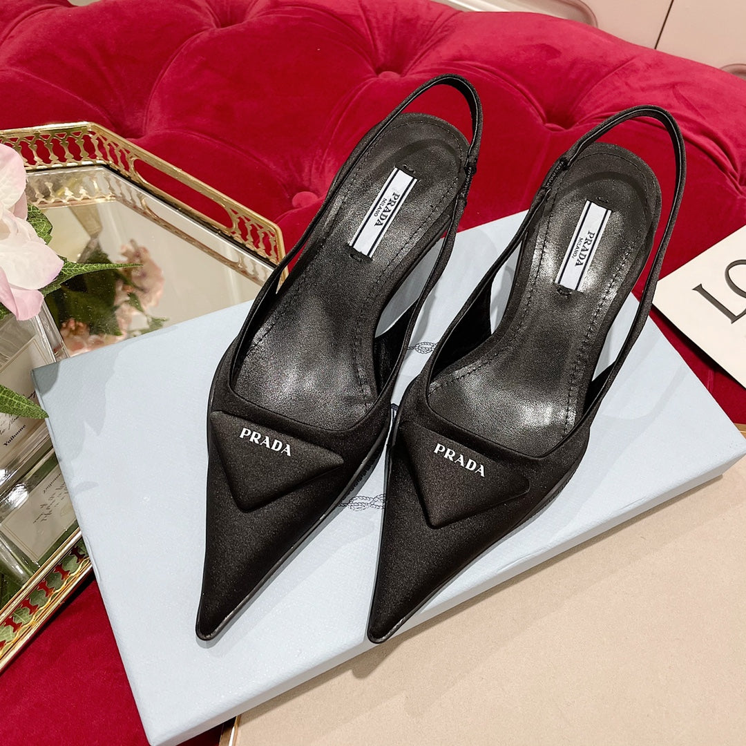 SLINGBACK PUMPS IN BLACK SILK AND SHEEPSKIN LINING WITH TRIANGLE LOGO