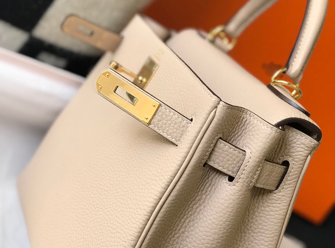 hm kelly 32cm beige togo leather gold hardware