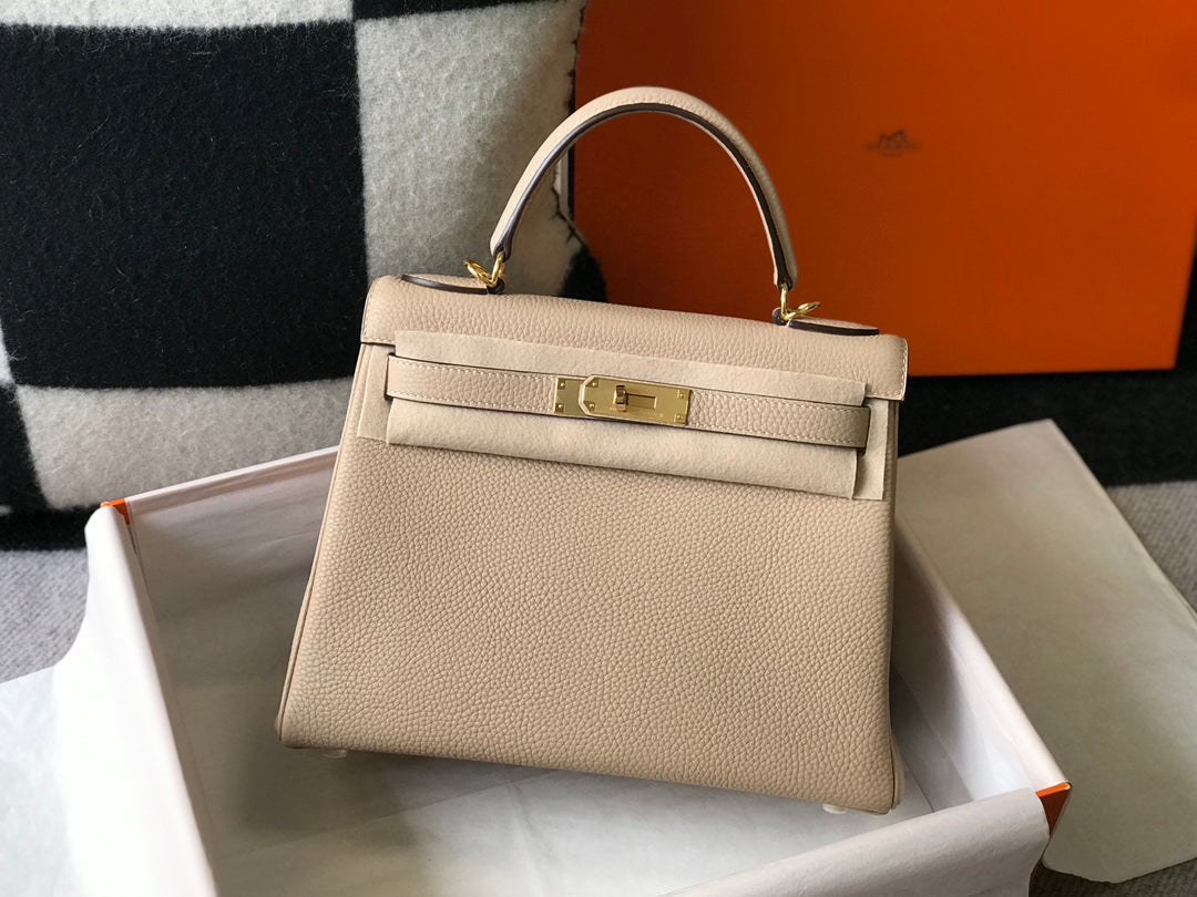 hm kelly 32cm beige togo leather gold hardware