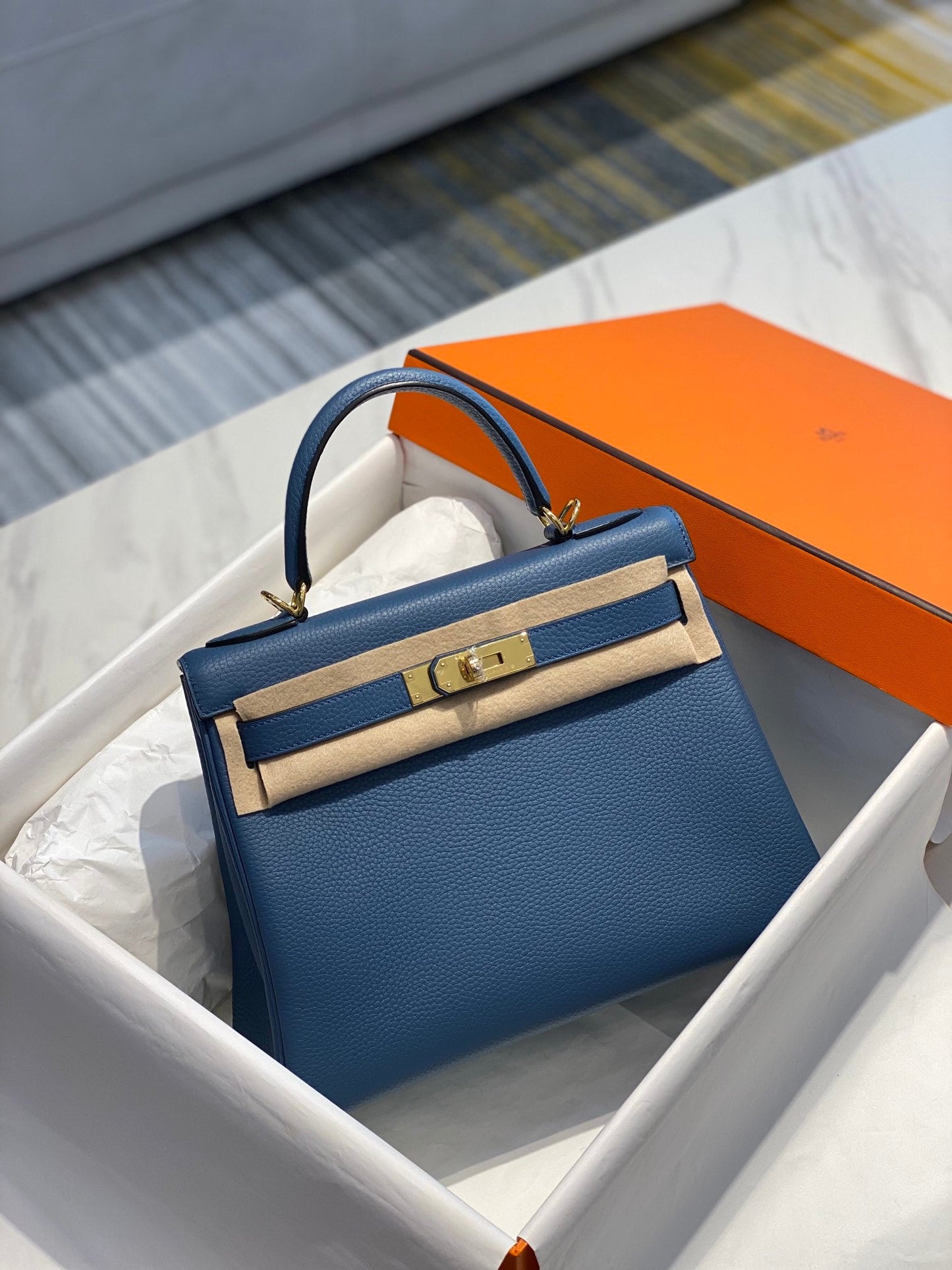 hm kelly 32cm blue togo leather gold hardware