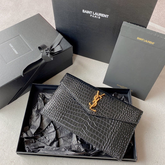 UPTOWN POUCH 27 IN BLACK CROCODILE-EMBOSSED SHINY CALFSKIN GOLD LOGO