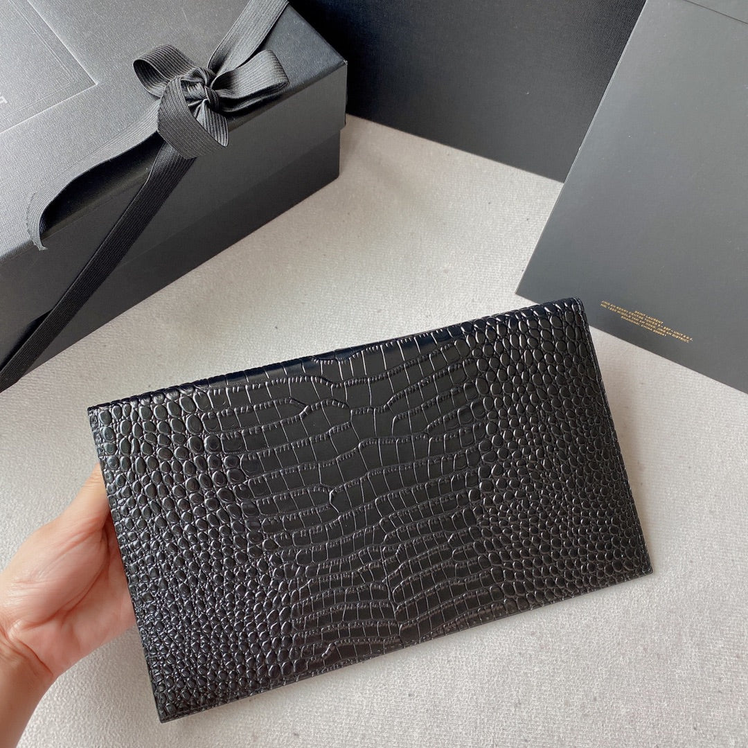 UPTOWN POUCH 27 IN BLACK CROCODILE-EMBOSSED SHINY CALFSKIN GOLD LOGO