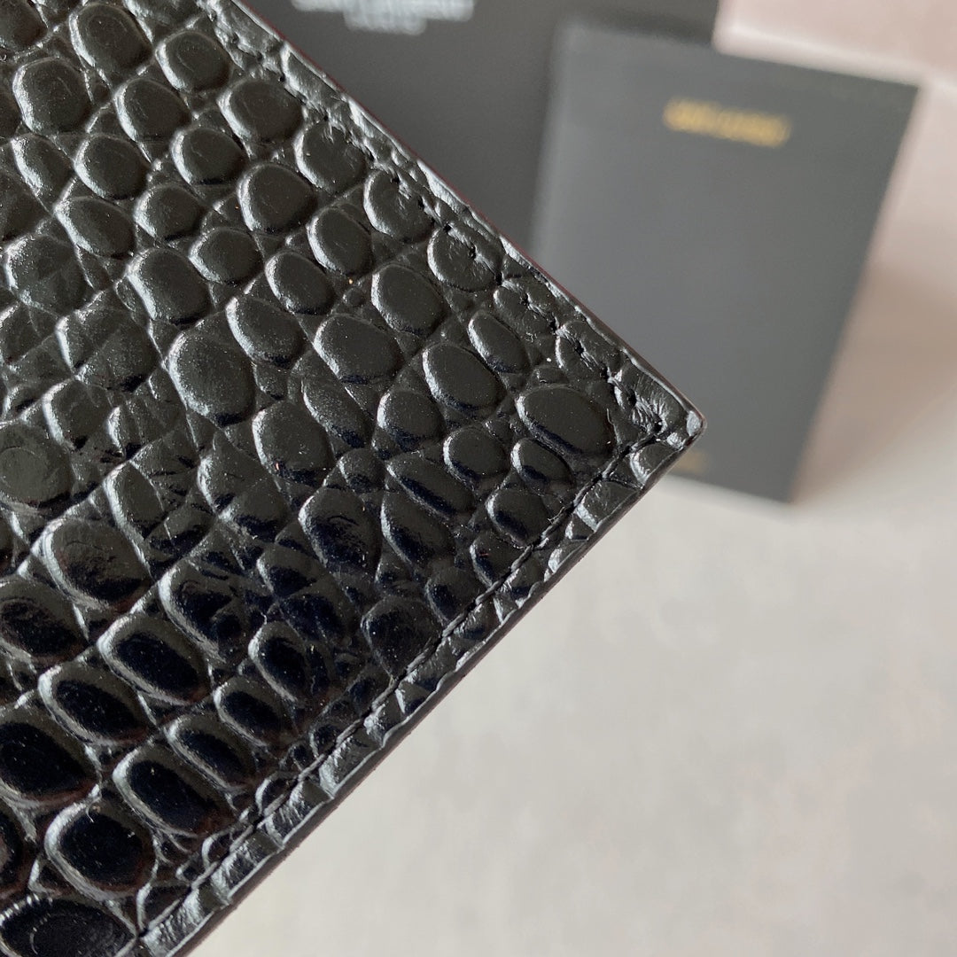 UPTOWN POUCH 27 IN BLACK CROCODILE-EMBOSSED SHINY CALFSKIN GOLD LOGO