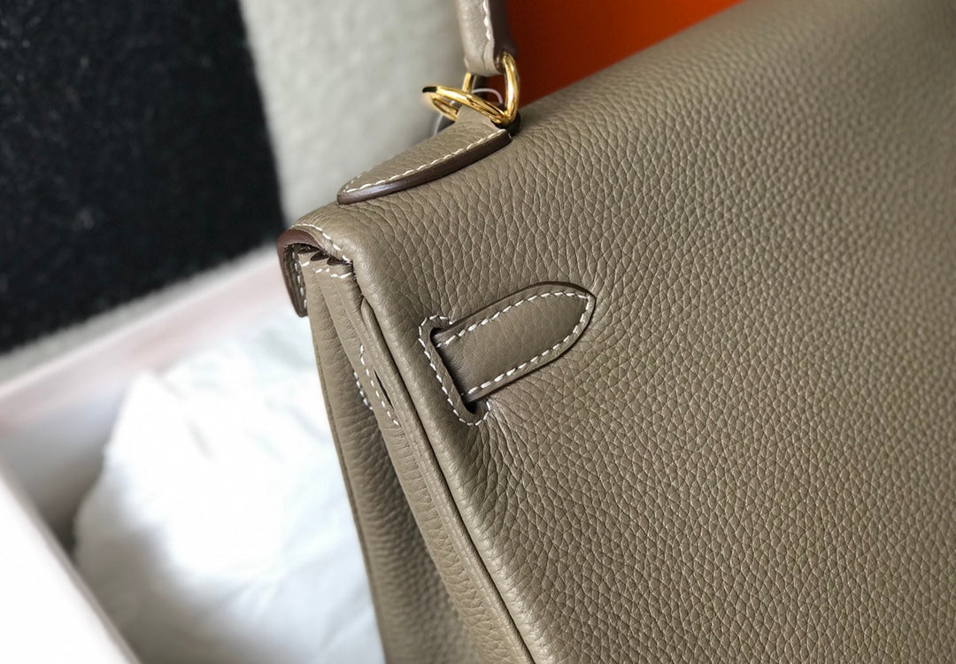 hm kelly 32cm taupe togo leather gold hardware