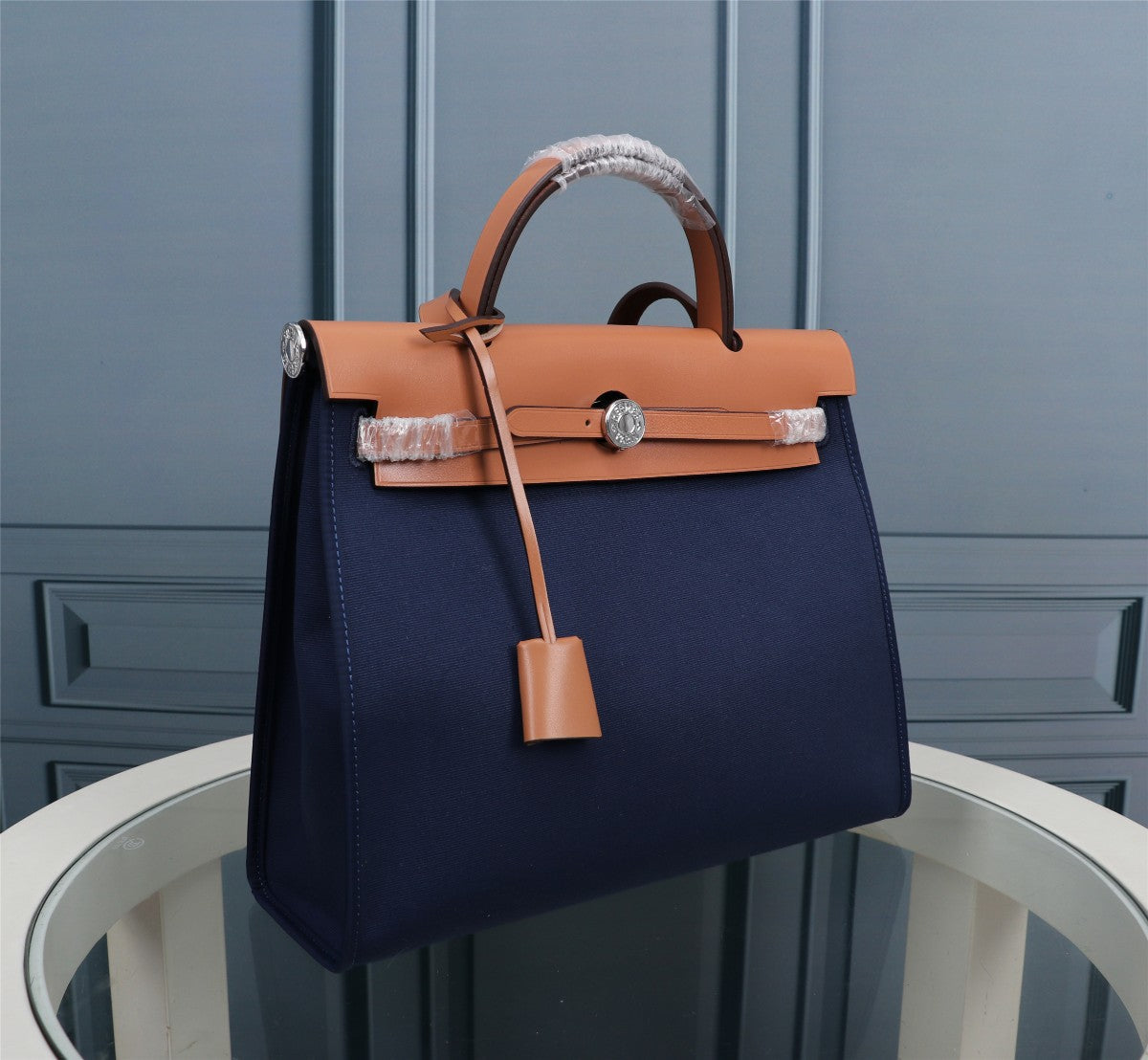 HM HERBAG ZIP 31 NAVY AND BRONZE CANVAS