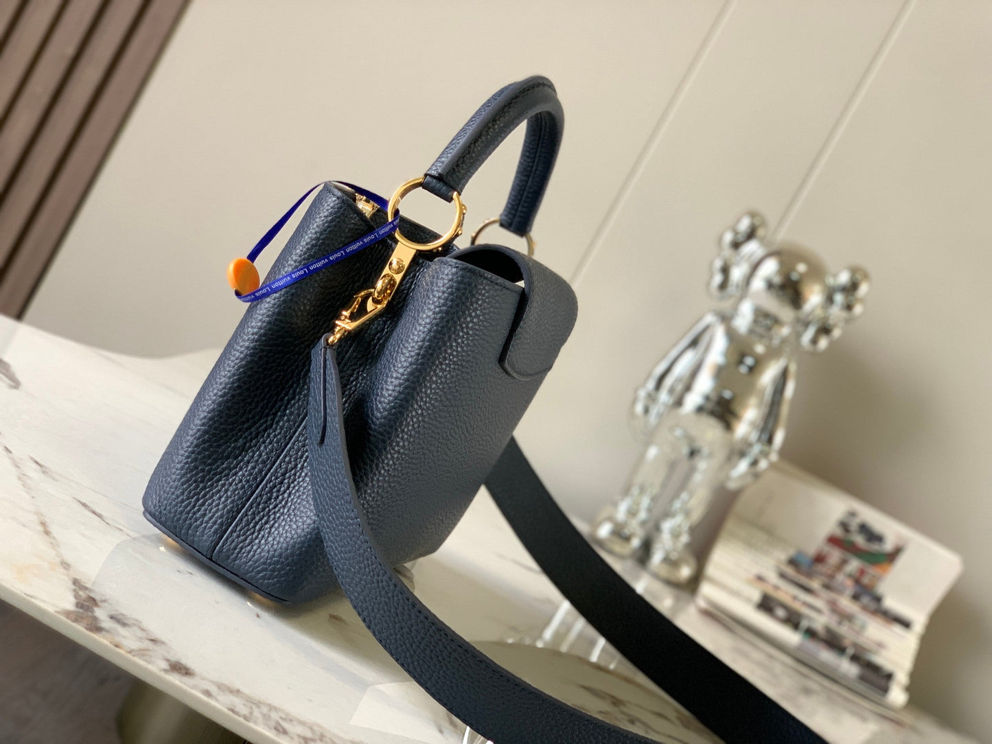 capucines bb 27 midnight blue taurillon leather gold hardware