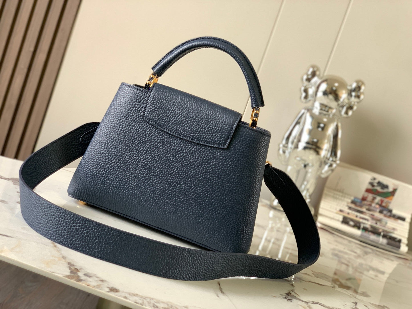 capucines bb 27 midnight blue taurillon leather gold hardware