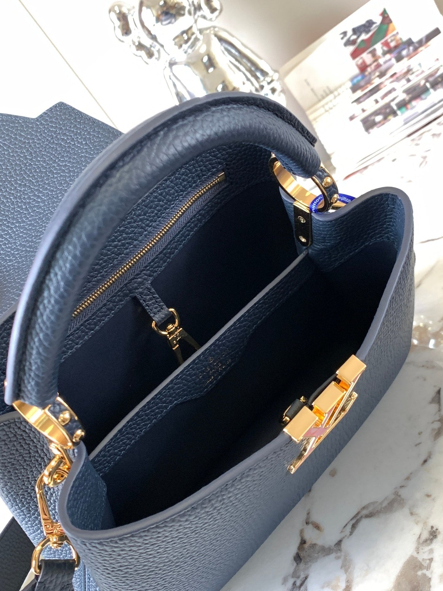 capucines bb 27 midnight blue taurillon leather gold hardware