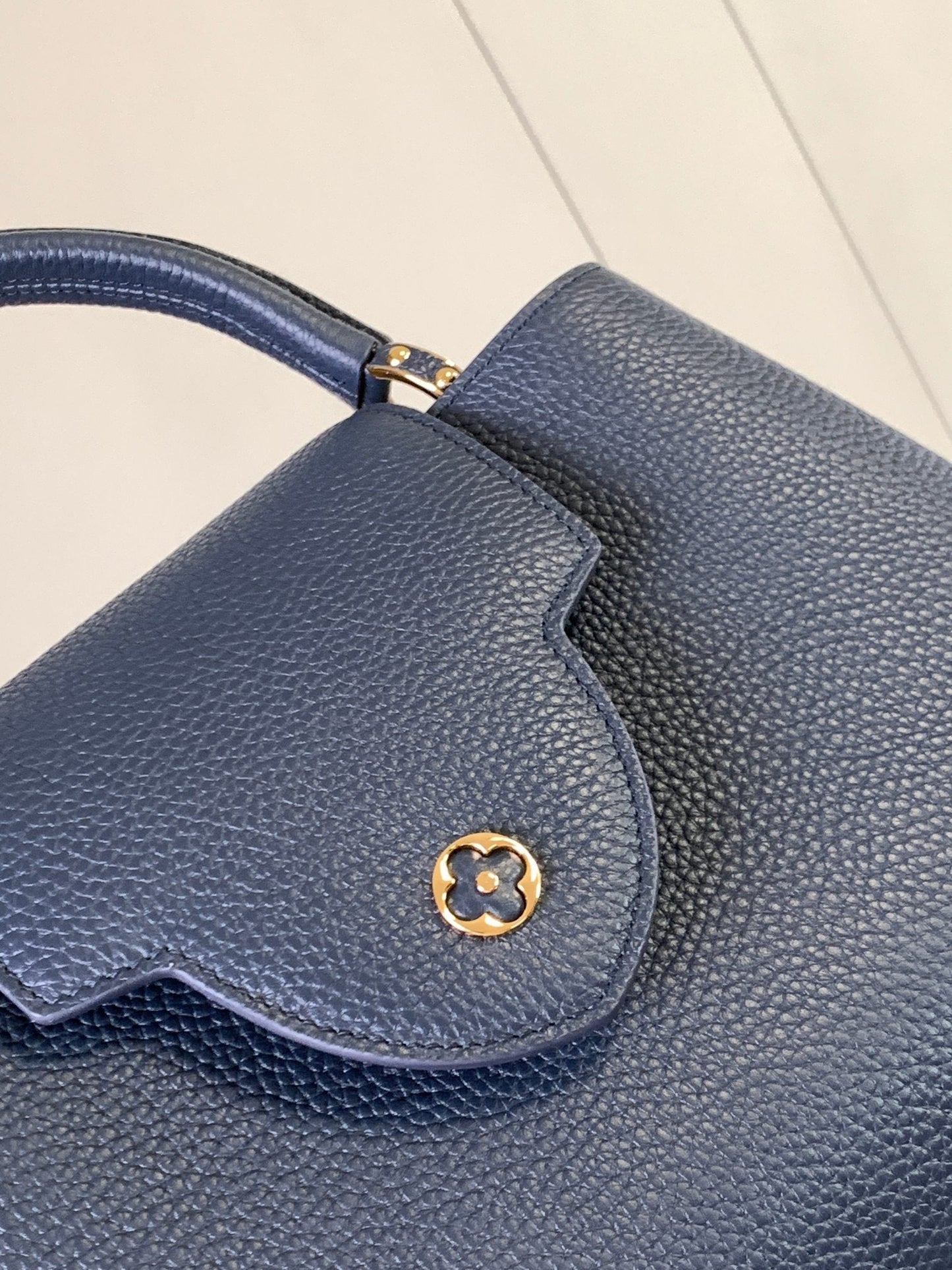 capucines mm 31.5 midnight blue taurillon leather gold hardware