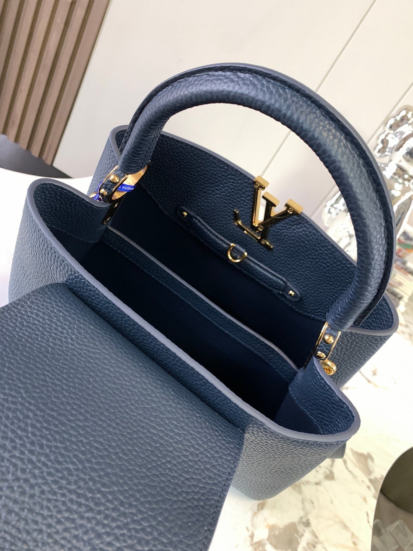 capucines mm 31.5 midnight blue taurillon leather gold hardware