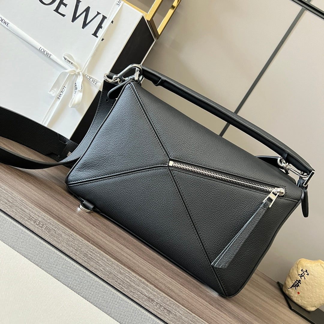 Puzzle bag 29cm in soft grained black calfskin