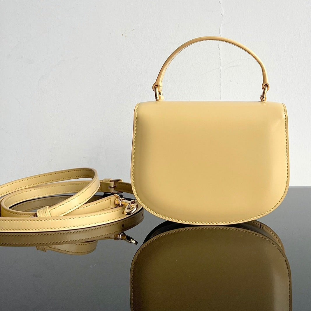 TRIOMPHE SHINY CALFSKIN HANDBAG 18 YELLOW PASTEL