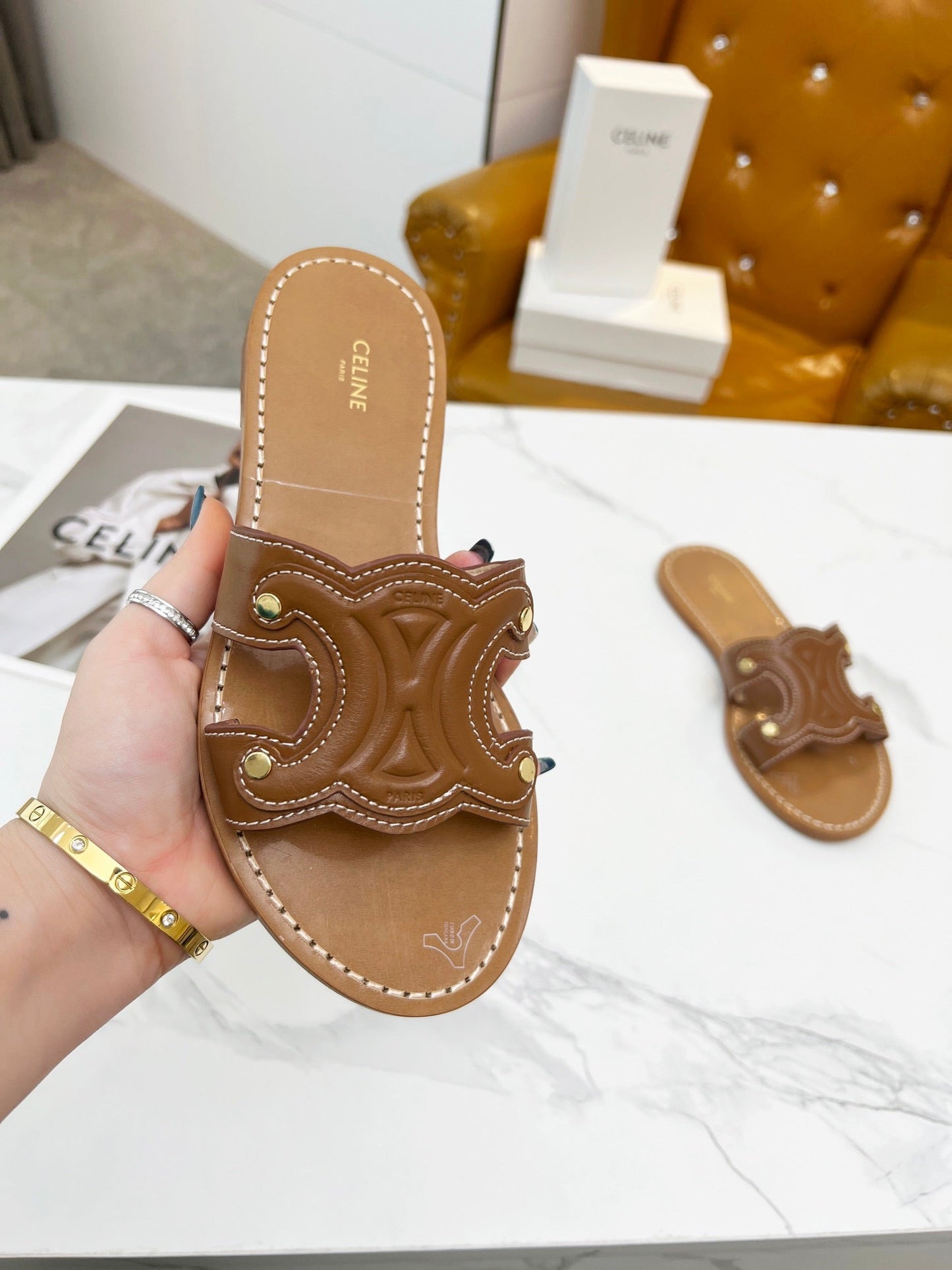 TRIOMPHE SLIDE IN BRONZE BROWN CALFSKIN