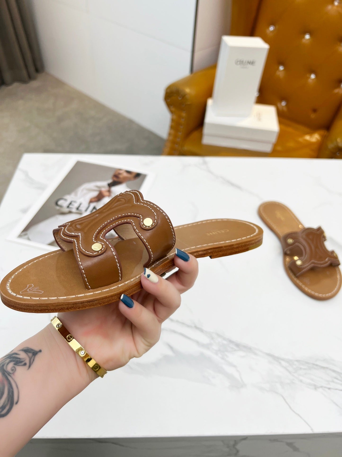 TRIOMPHE SLIDE IN BRONZE BROWN CALFSKIN