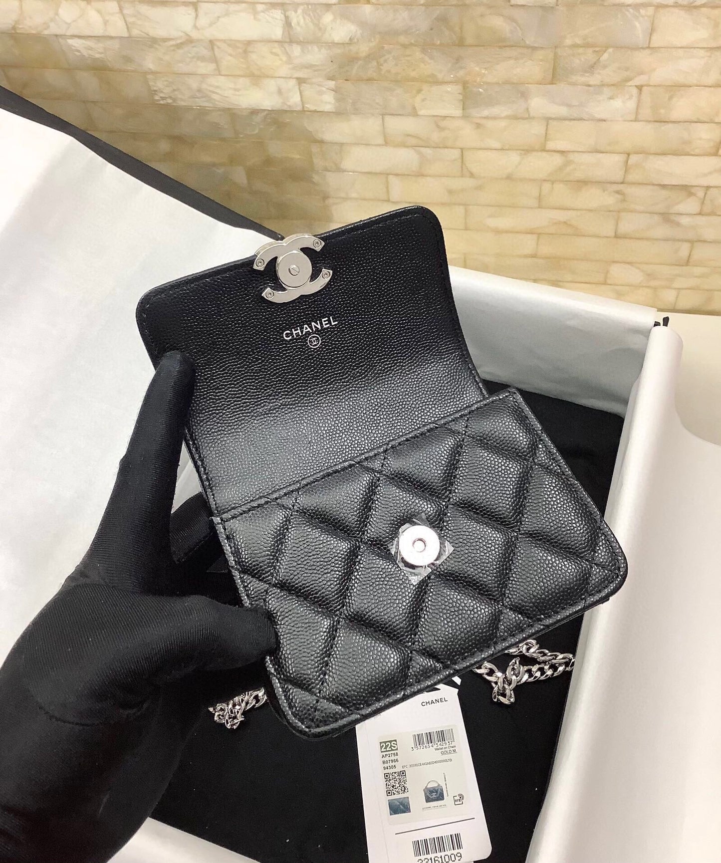 cc mini woc 13cm with top handle black quilted caviar leather silver hardware