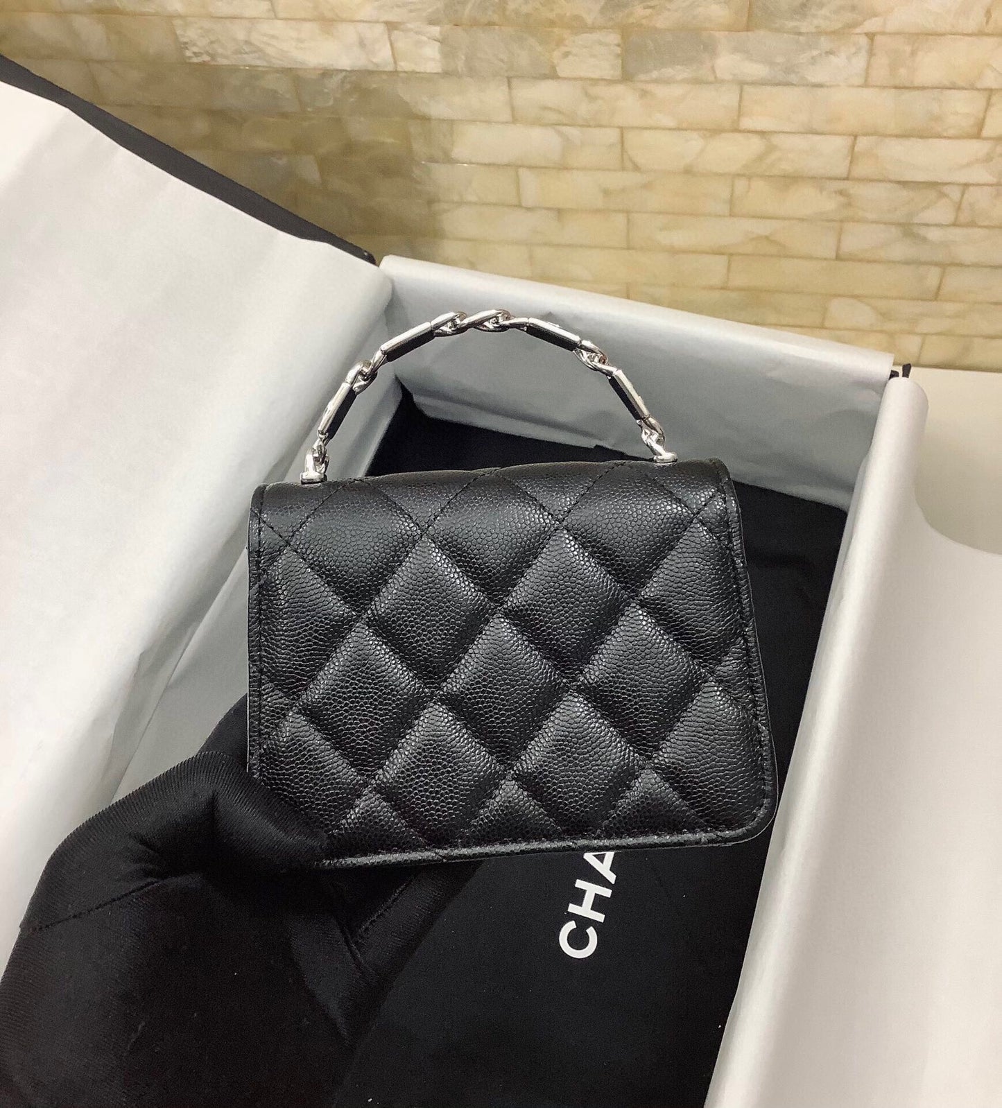 cc mini woc 13cm with top handle black quilted caviar leather silver hardware