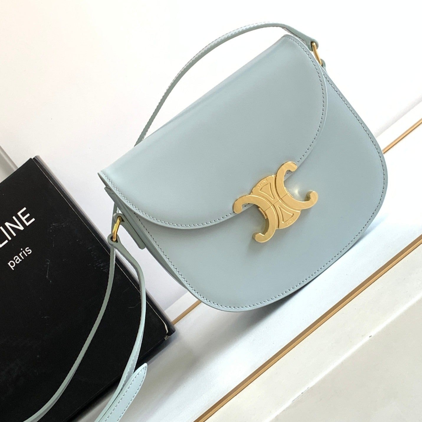 teen besace triomphe 18.5 cloud blue calfskin