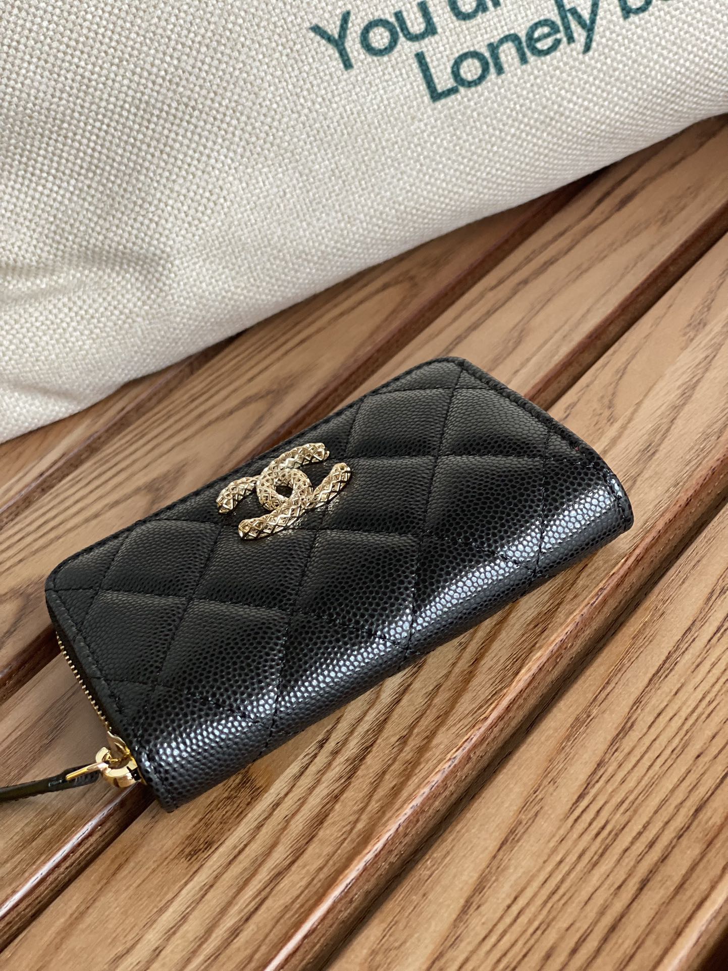 cc zipped wallet 11cm black caviar gold hardware