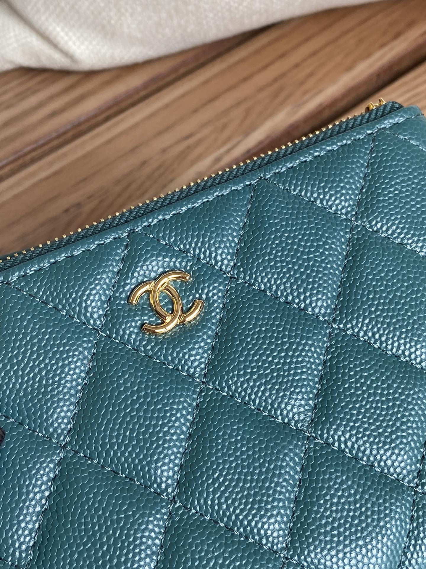 cc zipped wallet 15 blue green caviar gold hardware