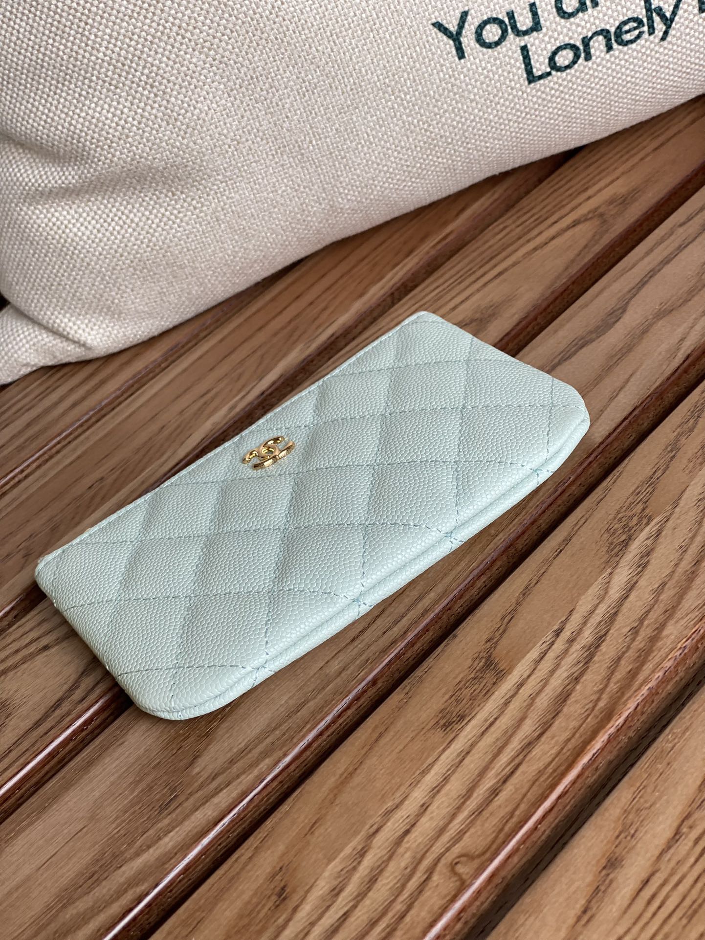 cc zipped wallet 15 light cloud blue caviar gold hardware