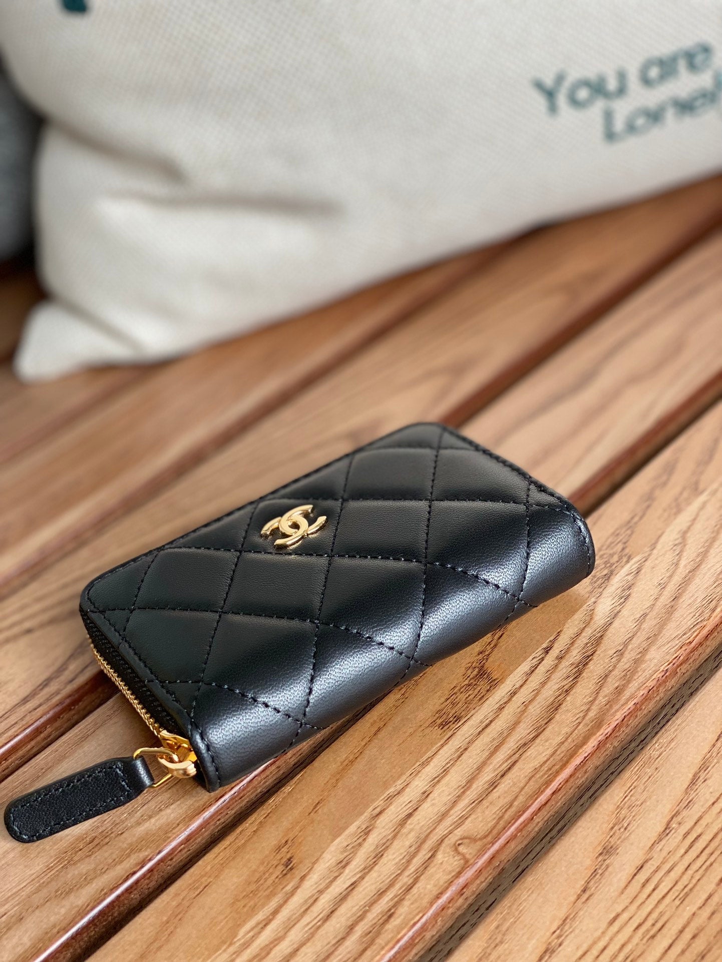 cc zipped wallet 7.5cm black calfksin gold hardware