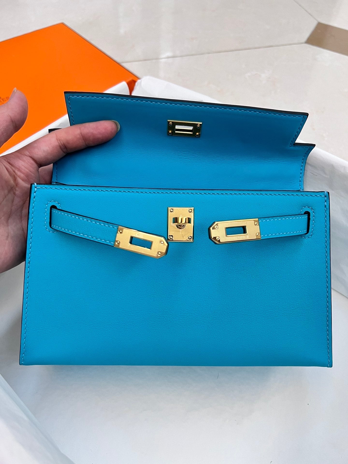 HM KELLY POCHETTE 22CM CERULEAN SWIFT GOLD HARDWARE