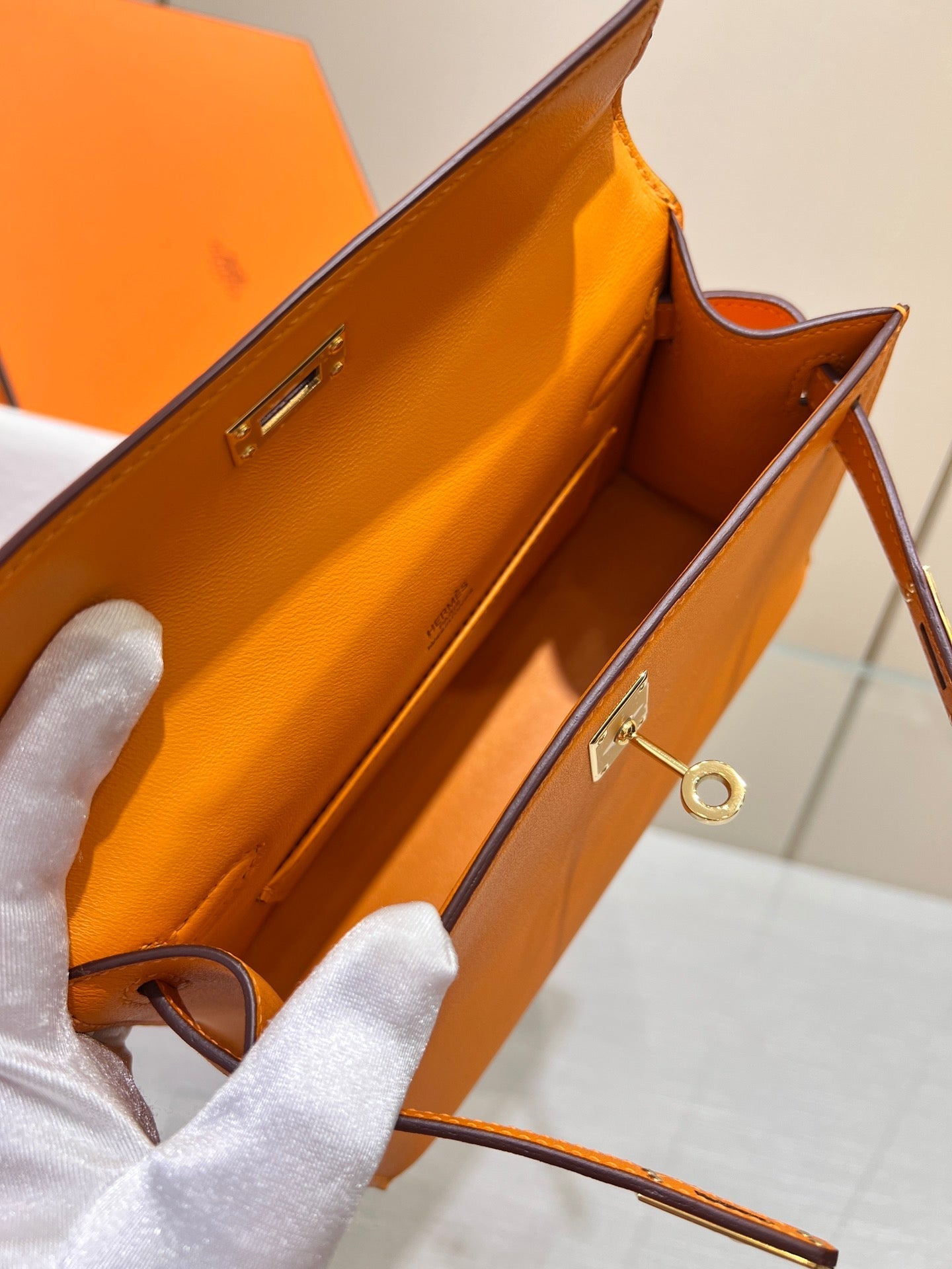 HM KELLY POCHETTE 22CM ORANGE SWIFT GOLD HARDWARE