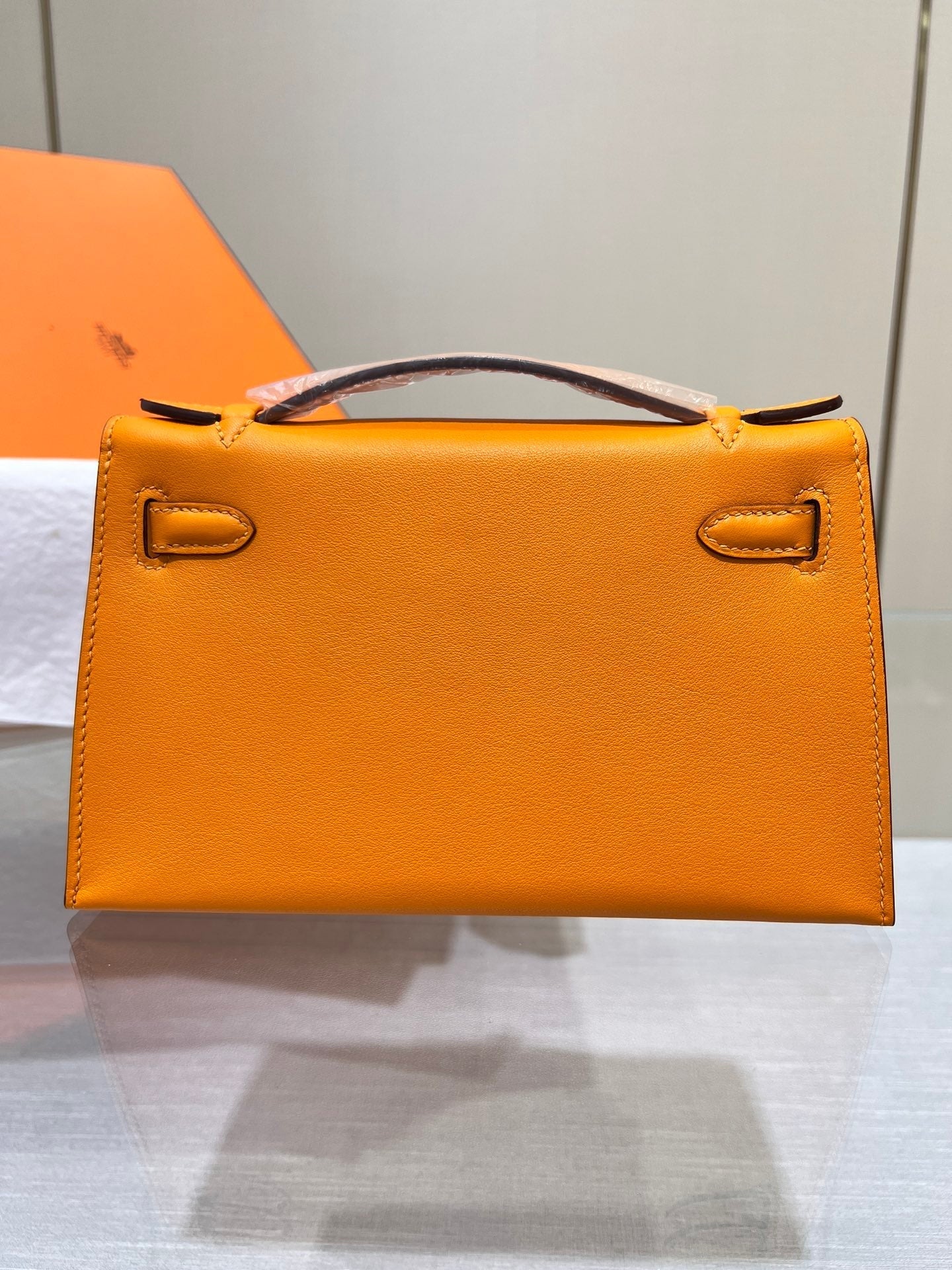 HM KELLY POCHETTE 22CM ORANGE SWIFT GOLD HARDWARE