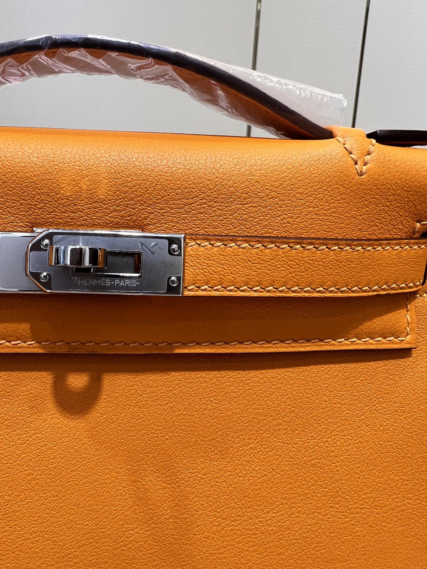 HM KELLY POCHETTE 22CM ORANGE SWIFT SILVER HARDWARE