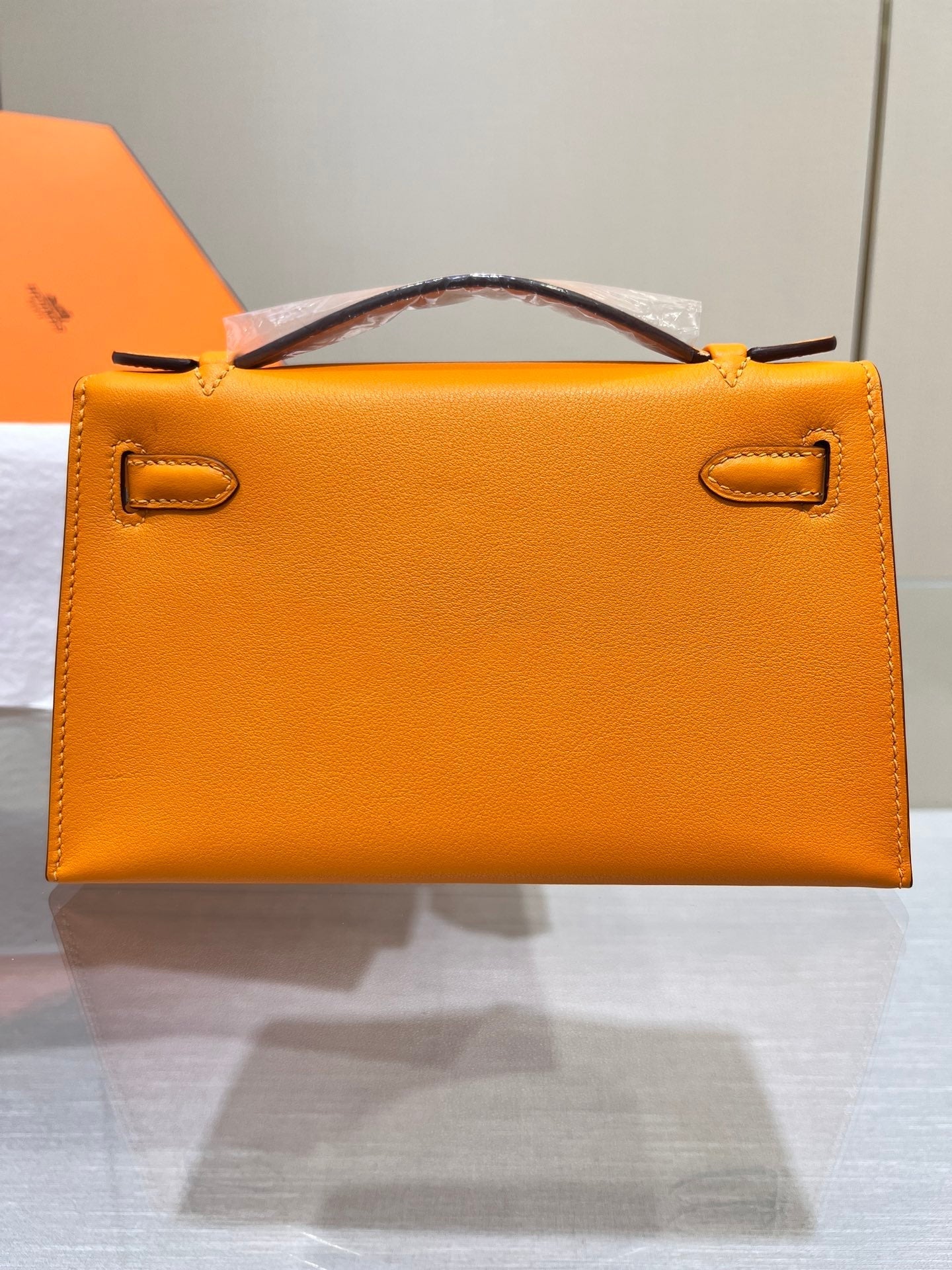 HM KELLY POCHETTE 22CM ORANGE SWIFT SILVER HARDWARE